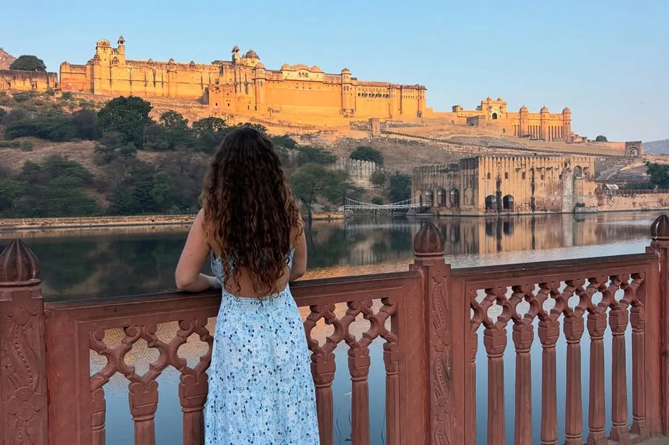Amber Palace Rajasthan with intricate carvings and panoramic Aravalli hill backdrop