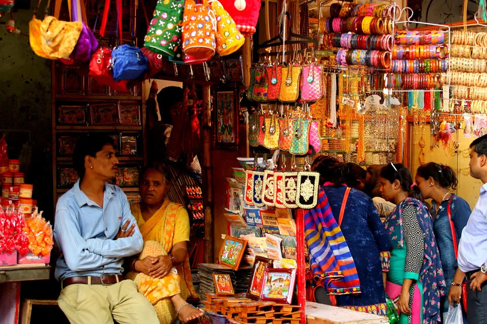 Vibrant and bustling markets of Pushkar with colorful textiles, handicrafts, and spices