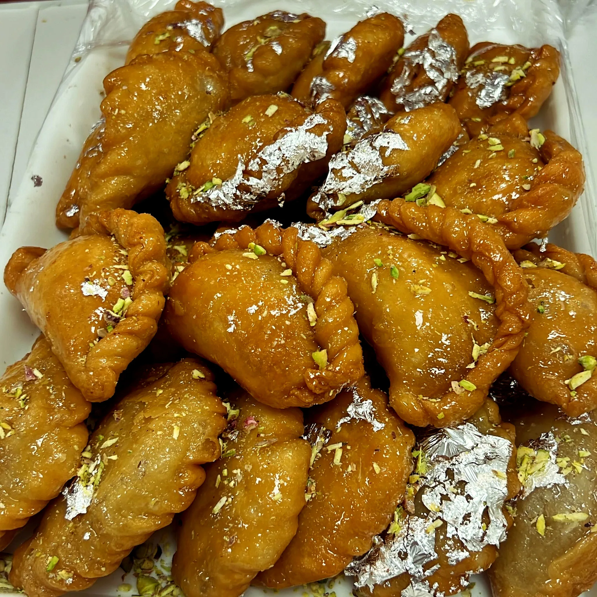 Gujia, a traditional Rajasthani sweet stuffed with khoya and dry fruits