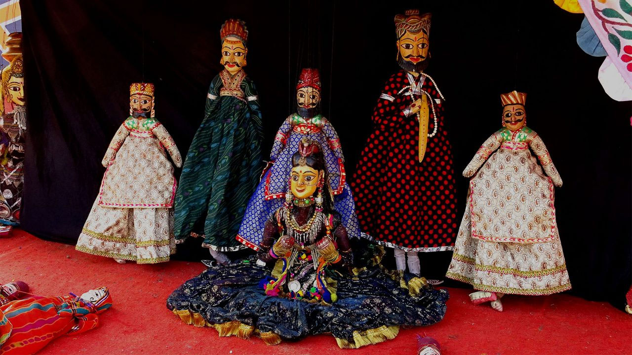 TRajasthan Kathputlis traditional puppets in colorful attire, showcasing the art of string puppetry.