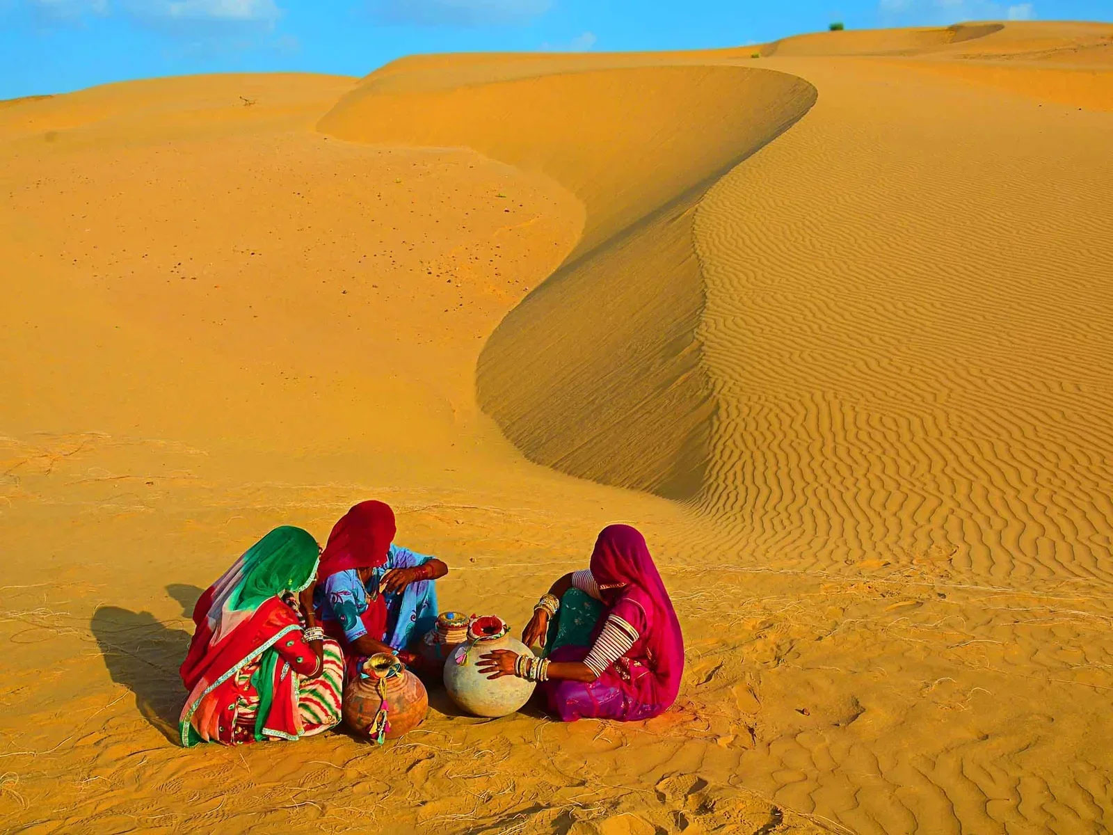 Rajasthan festival celebration with colorful costumes, music, and dance