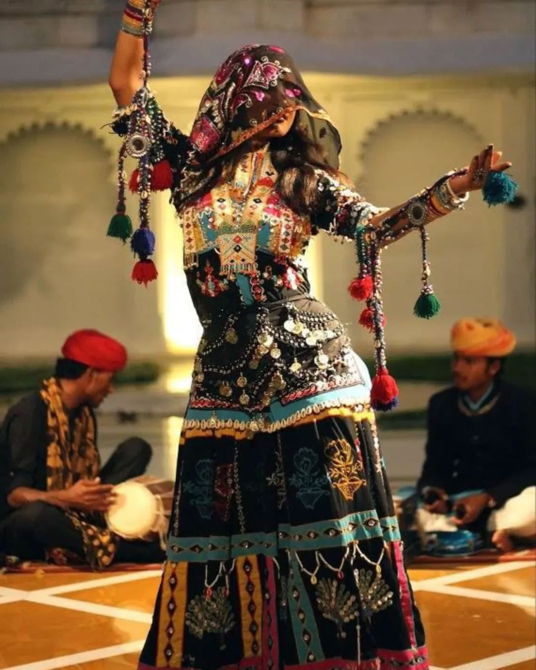 Rajasthani folk dancers performing traditional dance in colorful attire