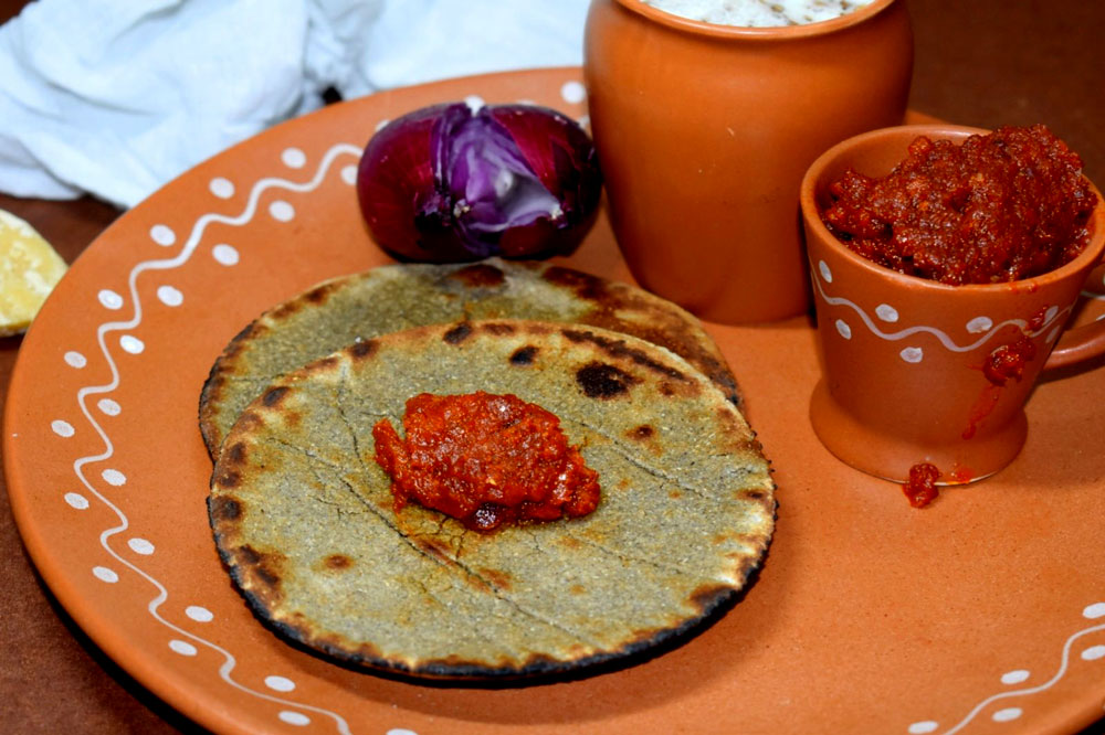 Rajasthani Bajre Ki Roti served on a rustic plate