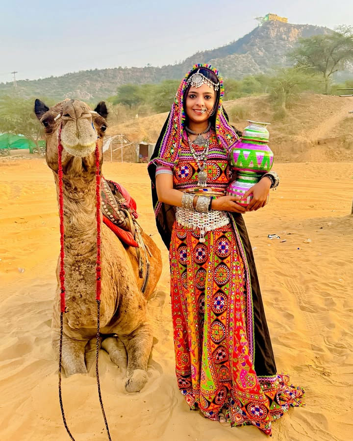 Rajasthani folk dancers in traditional colorful costumes celebrating local culture.