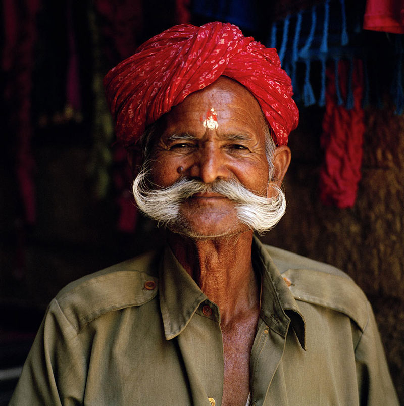 Rajasthani man dressed in traditional clothes with a red turban