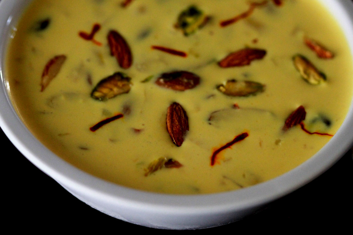 Traditional Rajasthani Rabri dessert made from thickened milk and dry fruits.